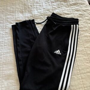Adidas Black and White Sweatpants with Iconic Stripes